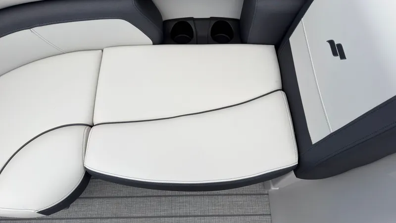 Slide: The Image of The 2027 Starcraft EX 20 Q DH features a white cushioned seat with gray accents. - 19