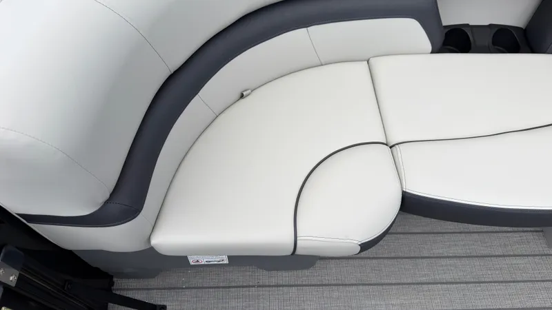 Slide: The Image of The image shows a sleek, upholstered seating area in a modern boat. - 17