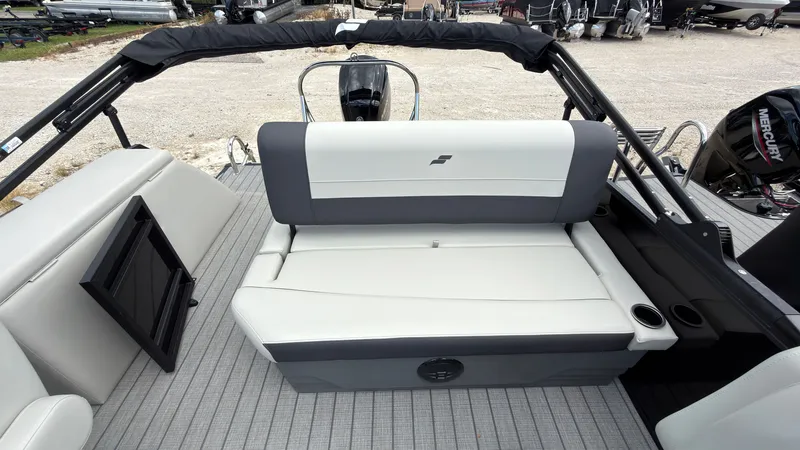 Slide: The Image of The image shows the stern of a Starcraft EX 20 Q DH boat with gray and white seating. - 41