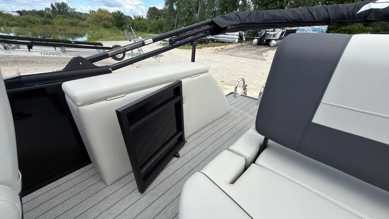 Slide: The Image of The image shows the deck of a 2027 Starcraft EX 20 Q DH with gray upholstery. - 43