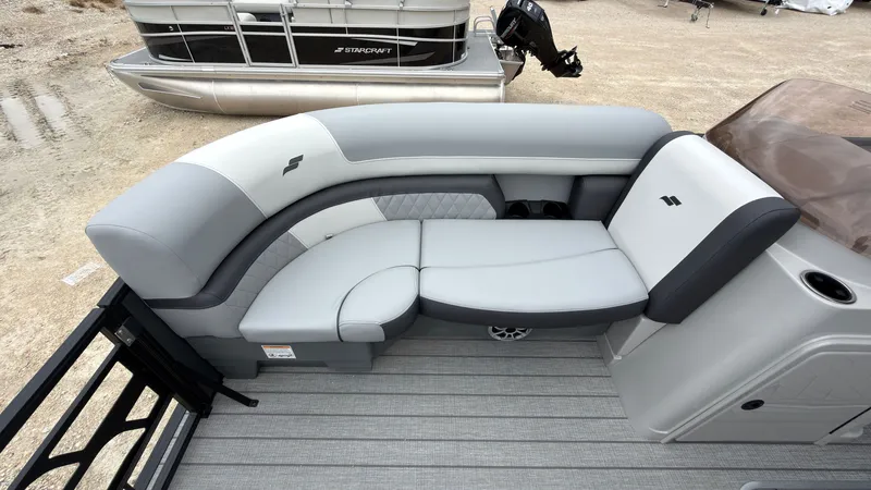 Slide: The Image of The image shows a modern, gray seating area on a boat with sleek upholstery. - 16