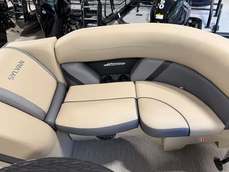 Slide: The Image of The image shows a beige and gray boat seat with Sylvan branding. - 10