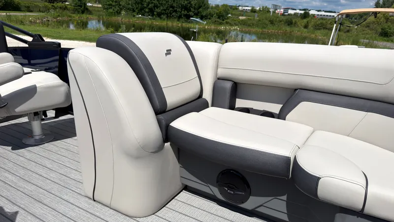Slide: The Image of The image shows the seating of a Starcraft EX 20 Q DH boat with gray and white upholstery. - 22
