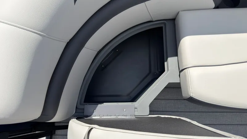 Slide: The Image of Close-up of a seating area with gray and white upholstery on a boat. - 13