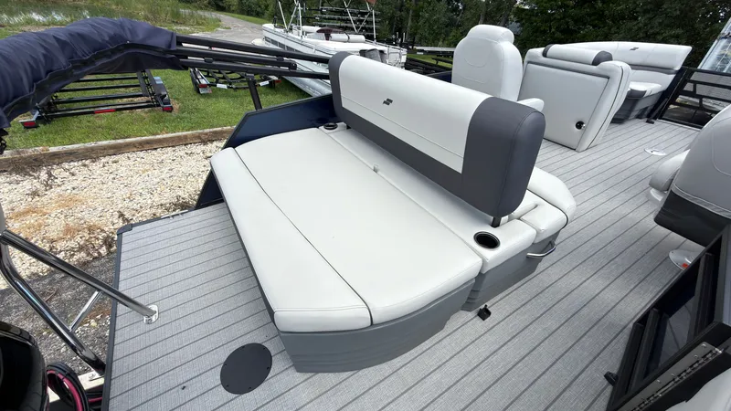 Slide: The Image of The image shows the deck of a 2027 Starcraft EX 20 Q DH with gray upholstered seating. - 46
