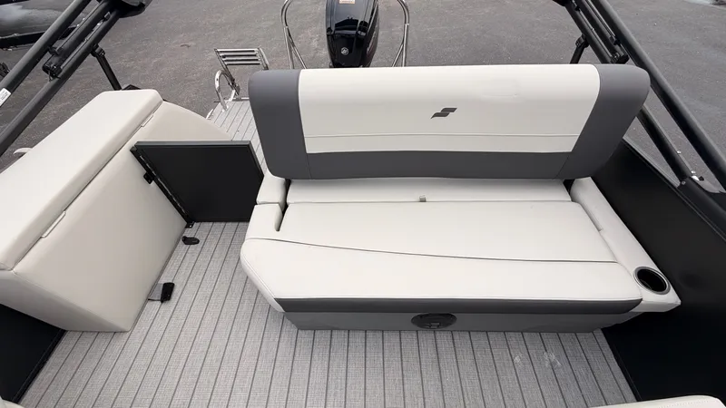 Slide: The Image of The image shows the seating area of a 2027 Starcraft EX 20 Q DH boat with gray and white upholstery. - 41