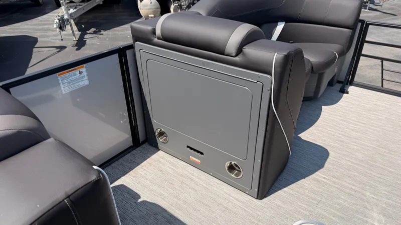 Slide: The Image of The image shows the interior of a 2026 Sylvan MIRAGE X3 DLZ BAR with gray upholstery. - 27