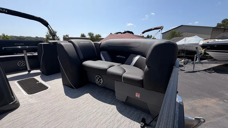 Slide: The Image of Sylvan MIRAGE X3 DLZ BAR 2026 with sleek black seating and modern design outdoors. - 9