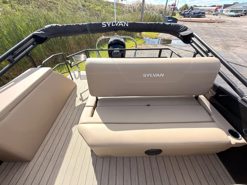 Slide: The Image of 2027 Sylvan Mirage 8520 CLZ DH with beige seating area and black railing. - 49