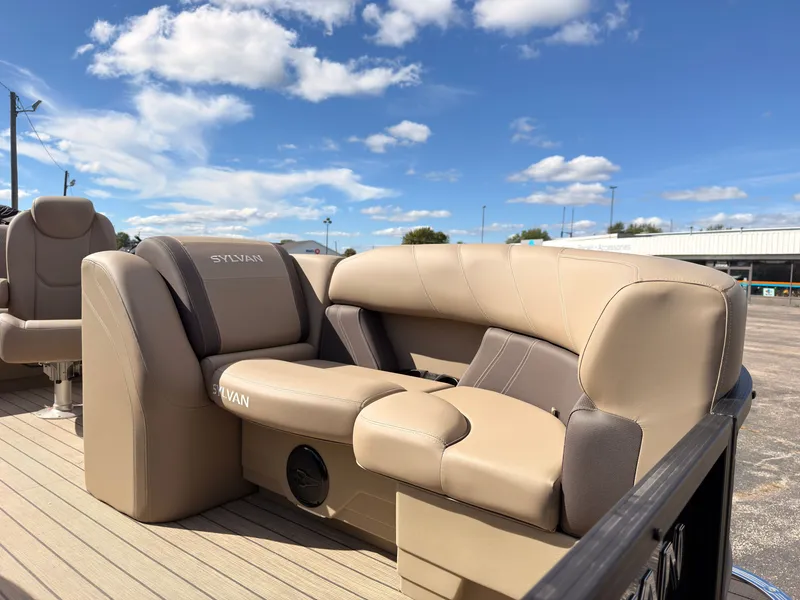 Slide: The Image of The image shows beige leather seating on a 2027 Sylvan Mirage 8520 CLZ DH. - 11