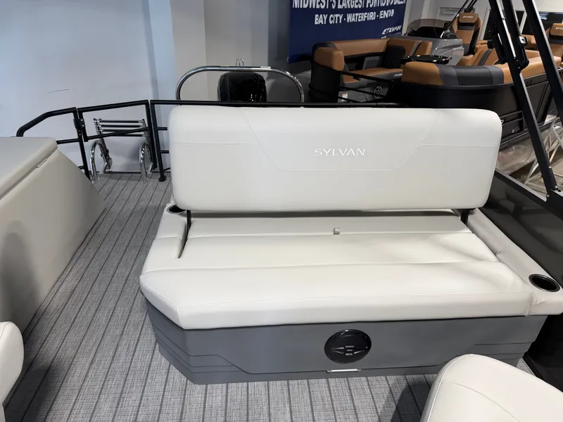 Slide: The Image of The image shows a modern boat seat with gray flooring and a sleek design. - 17