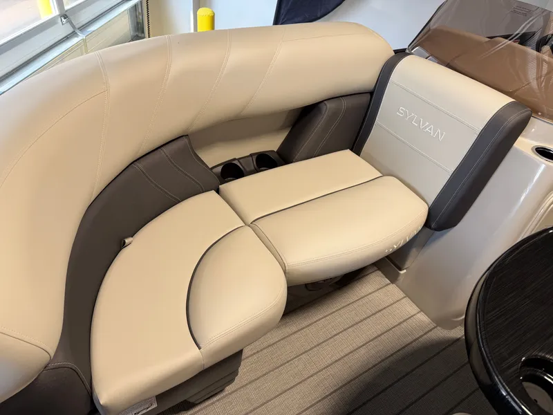 Slide: The Image of The 2027 Sylvan Mirage 8520 CLZ DH features elegant cream upholstery with gray accents. - 4