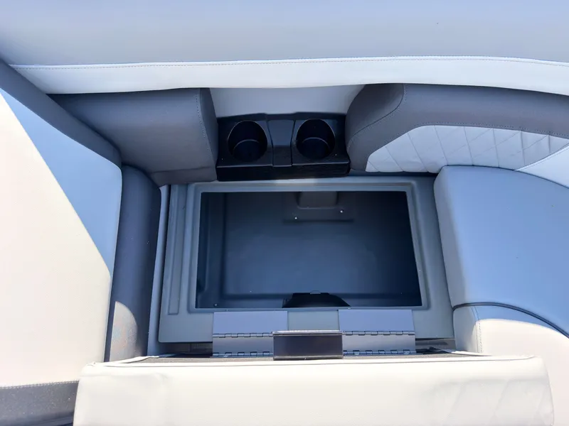 Slide: The Image of A modern boat seat with integrated storage and cup holders. - 13