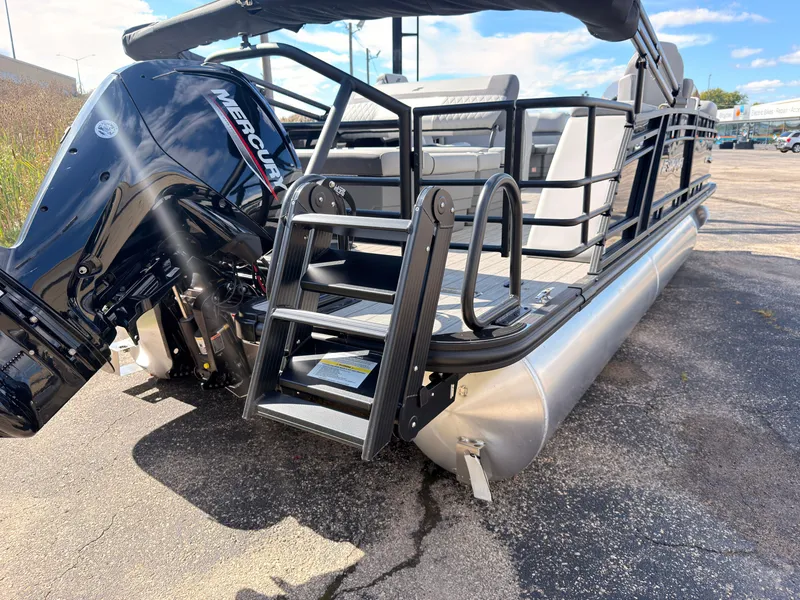Slide: The Image of A 2027 Starcraft EXS 1 Q DH pontoon boat with a Mercury outboard motor. - 48