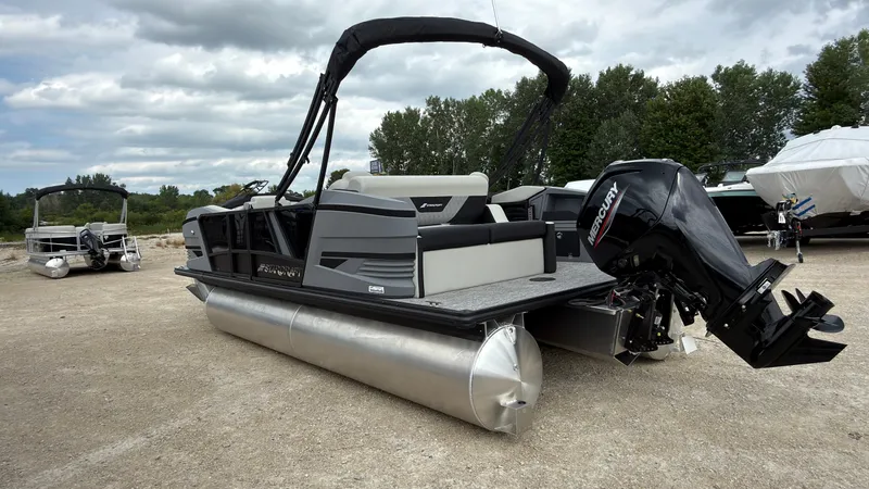 Slide: The Image of The image shows a 2027 Starcraft VX 20 Q DH pontoon boat with a Mercury outboard motor. - 4