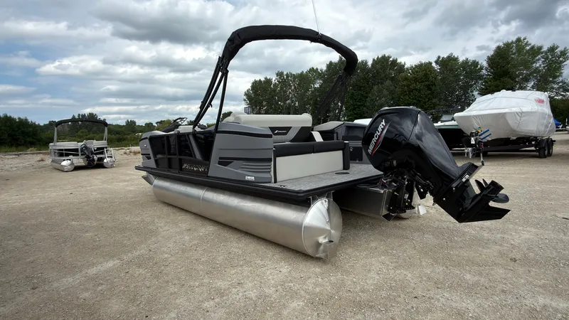 Slide: The Image of The image shows a 2027 Starcraft VX 20 Q DH pontoon boat with an outboard motor. - 3