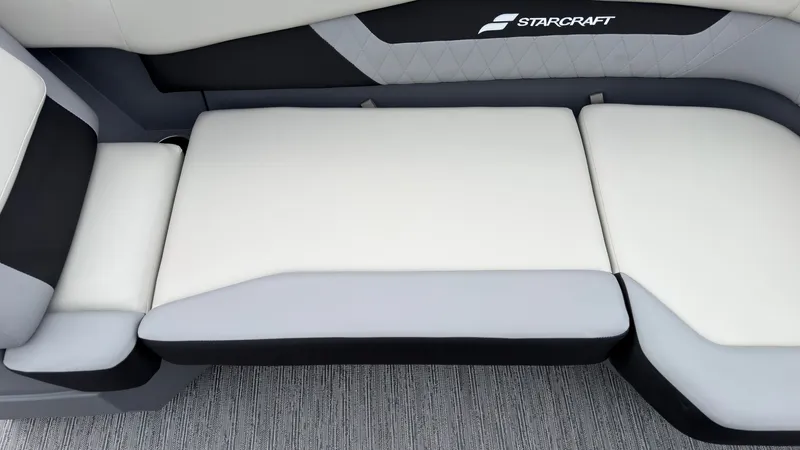 Slide: The Image of The 2027 Starcraft VX 20 Q DH features a stylish, cushioned seating area in gray and white. - 24