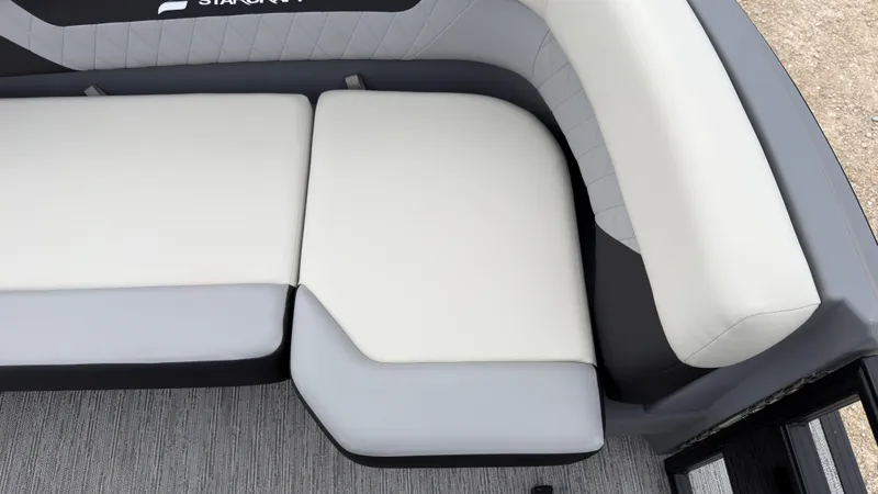 Slide: The Image of The 2027 Starcraft VX 20 Q DH features a sleek, cushioned bench with gray and white upholstery. - 22