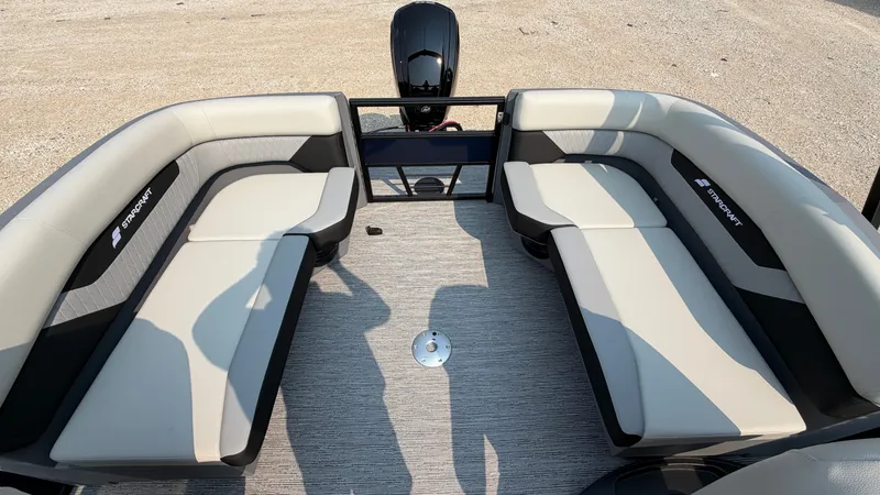 Slide: The Image of The image shows the spacious cockpit of a 2027 Starcraft VX 20 R DH with beige seating. - 38