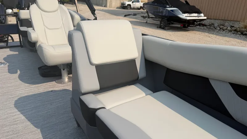 Slide: The Image of The image shows the interior of a 2027 Starcraft VX 20 R DH with modern, comfortable seating. - 20