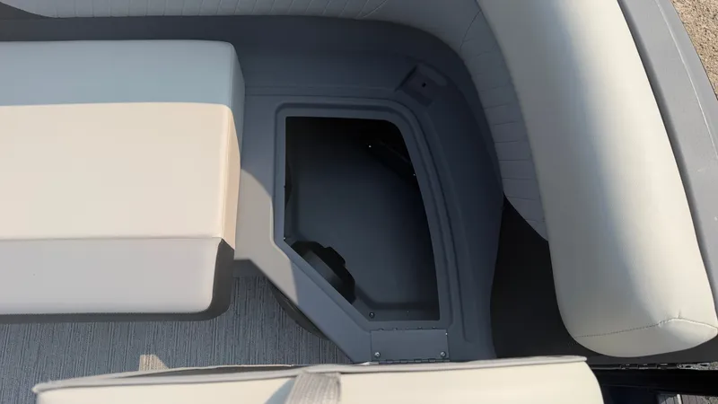 Slide: The Image of The image shows the seating area of a 2027 Starcraft VX 20 R DH with storage underneath. - 17