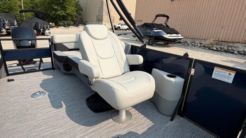 Slide: The Image of The 2027 Starcraft VX 20 R DH features a luxurious white captain's chair on a spacious deck. - 36