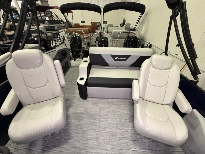 Slide: The Image of The image shows the interior of a 2027 Starcraft VX 20 Q DH with comfortable seating. - 23