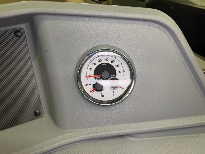 Slide: The Image of Close-up of a boat instrument panel featuring a speedometer and fuel gauge. - 18
