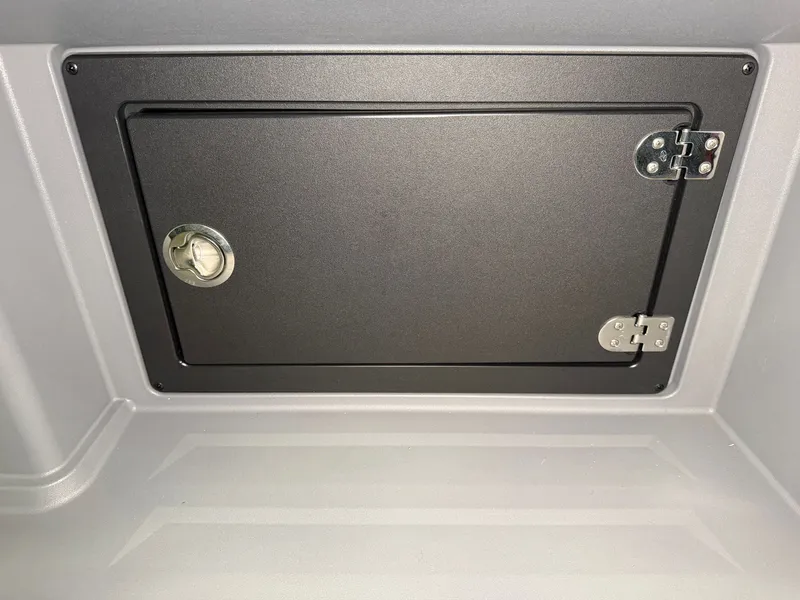 Slide: The Image of A secure, lockable storage compartment with a sturdy hinge and a round handle. - 22