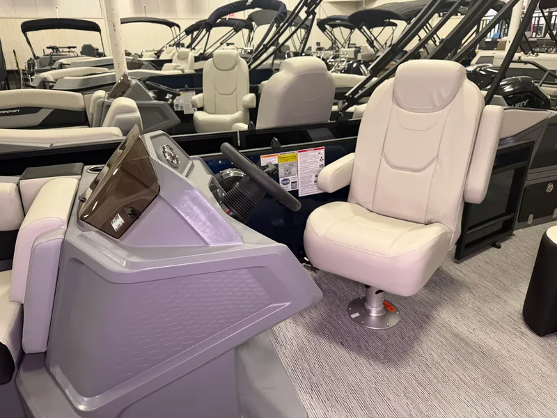 Slide: The Image of The image shows the helm of a Starcraft VX 20 Q DH with a comfortable captain's chair. - 14