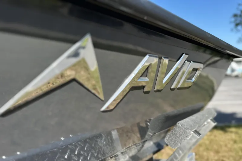Slide: The Image of Close-up of 2026 Avid 20 Rogue CC boat logo on sleek exterior. - 11
