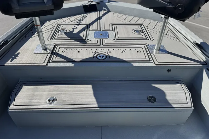 Slide: The Image of Deck of 2026 Avid 20 Rogue CC boat with seating and measurement markings. - 21