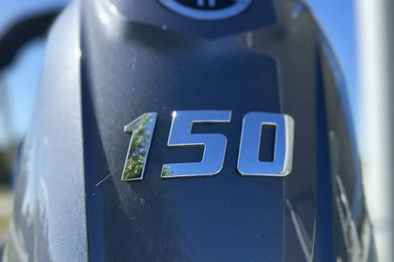 Slide: The Image of Close-up of "150" emblem on 2026 Avid 20 Rogue CC boat. - 4
