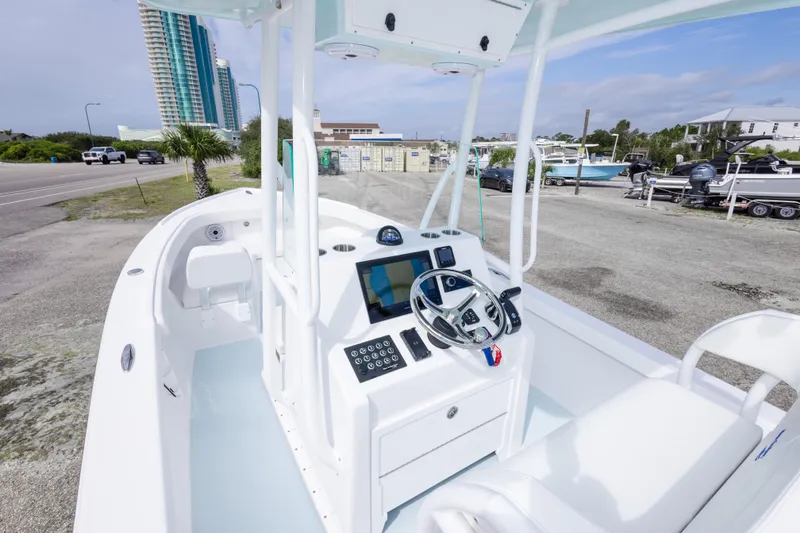 Slide: The Image of 2026 Albury Brothers 23 Forward Seating boat with modern console and steering wheel. - 31