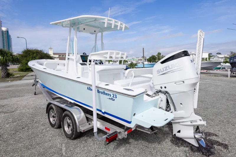 Slide: The Image of 2026 Albury Brothers 23 Forward Seating boat on trailer with Suzuki outboard motor. - 8