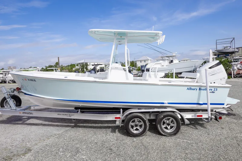Slide: The Image of 2026 Albury Brothers 23 Forward Seating boat on trailer, side view. - 9