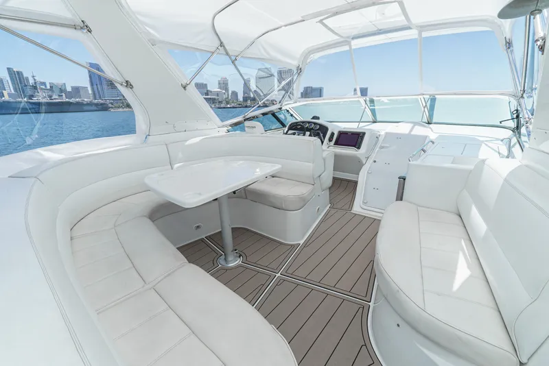Slide: The Image of Luxurious 1999 Carver 530 Voyager Pilothouse interior with city skyline view. - 35