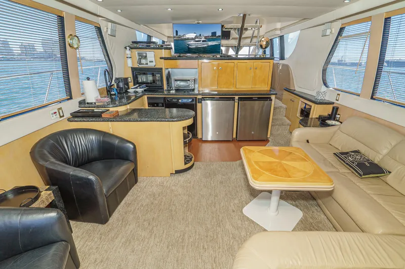 Slide: The Image of Luxurious interior of 1999 Carver 530 Voyager Pilothouse yacht with modern amenities. - 37