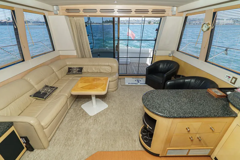 Slide: The Image of Luxurious interior of 1999 Carver 530 Voyager Pilothouse with leather seating and ocean view. - 38