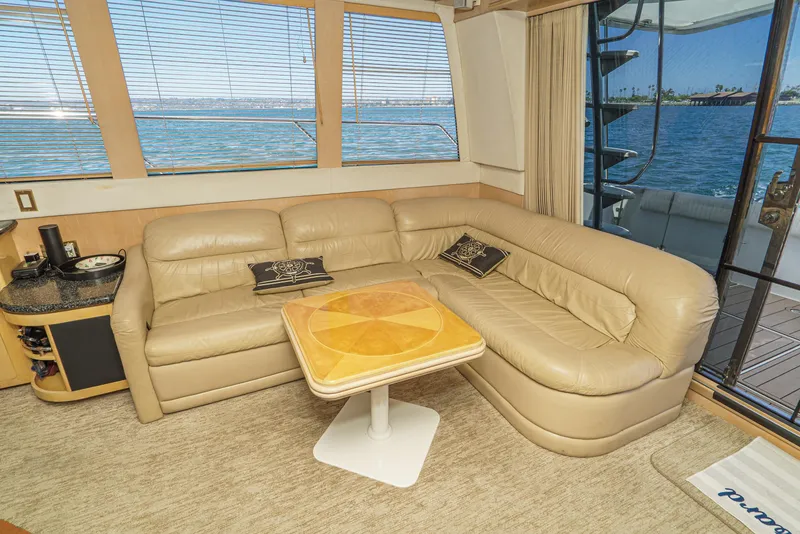 Slide: The Image of Luxurious interior of 1999 Carver 530 Voyager Pilothouse with leather seating and ocean view. - 39