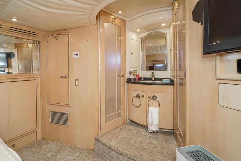 Slide: The Image of Luxurious bathroom interior of 1999 Carver 530 Voyager Pilothouse yacht. - 42