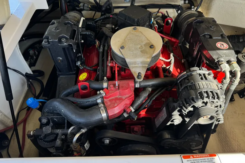 Slide: The Image of Engine of a 2005 Regal 2200 Bowrider boat, showcasing mechanical components. - 19