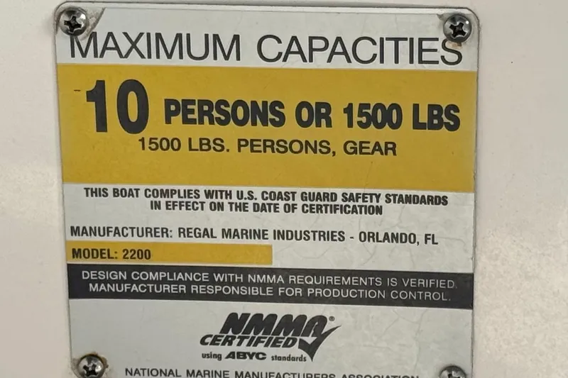 Slide: The Image of 2005 Regal 2200 Bowrider capacity plate: 10 persons or 1500 lbs, NMMA certified. - 32