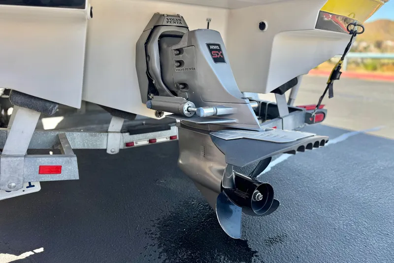 Slide: The Image of 2005 Regal 2200 Bowrider with Volvo Penta outdrive on trailer, close-up view. - 9