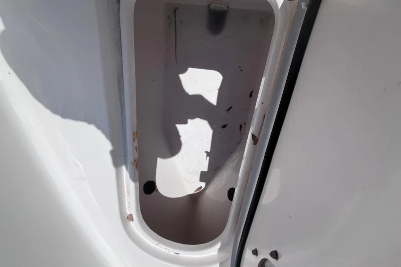 Slide: The Image of Storage compartment of a 2017 Tidewater 280 CC Adventure boat, showing interior details. - 35