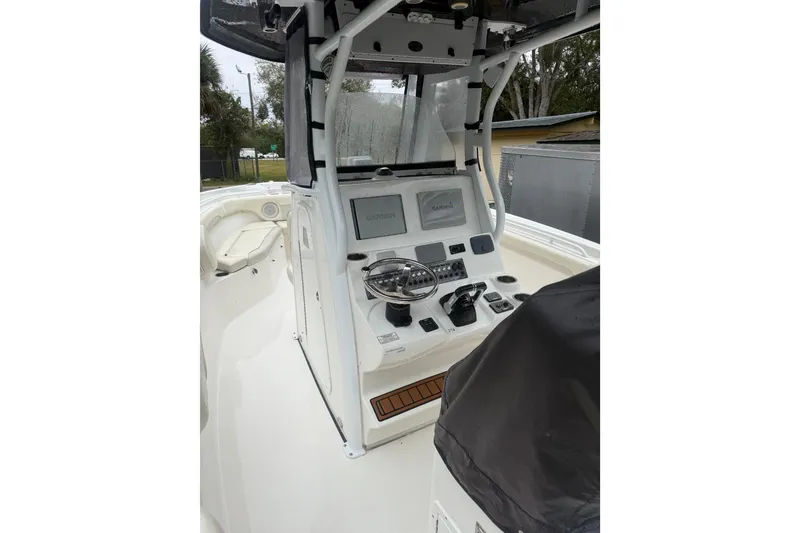 Slide: The Image of 2017 Tidewater 280 CC Adventure boat console with Garmin navigation system. - 6