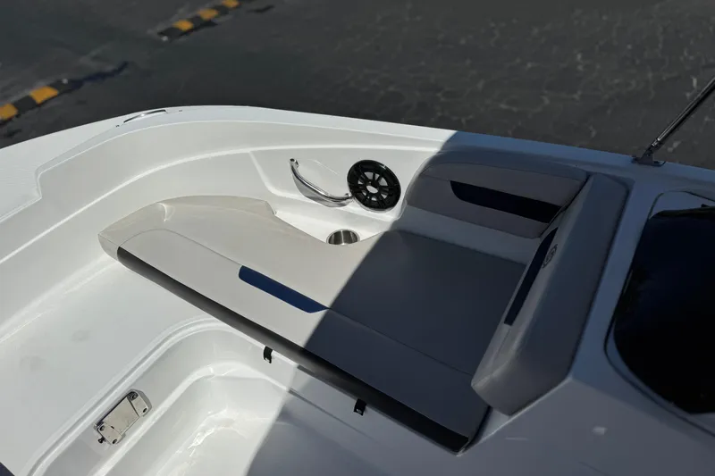 Slide: The Image of 2022 Hurricane SunDeck Sport 185 OB boat interior with seating and speaker. - 13