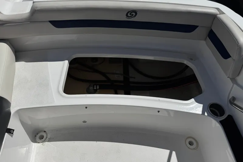 Slide: The Image of 2022 Hurricane SunDeck Sport 185 OB boat interior with storage compartment. - 19