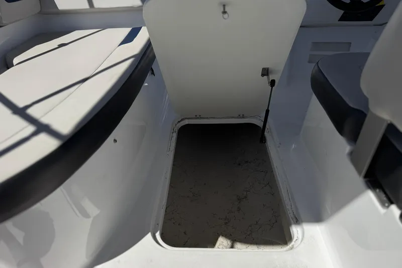 Slide: The Image of 2022 Hurricane SunDeck Sport 185 OB boat interior storage compartment. - 21