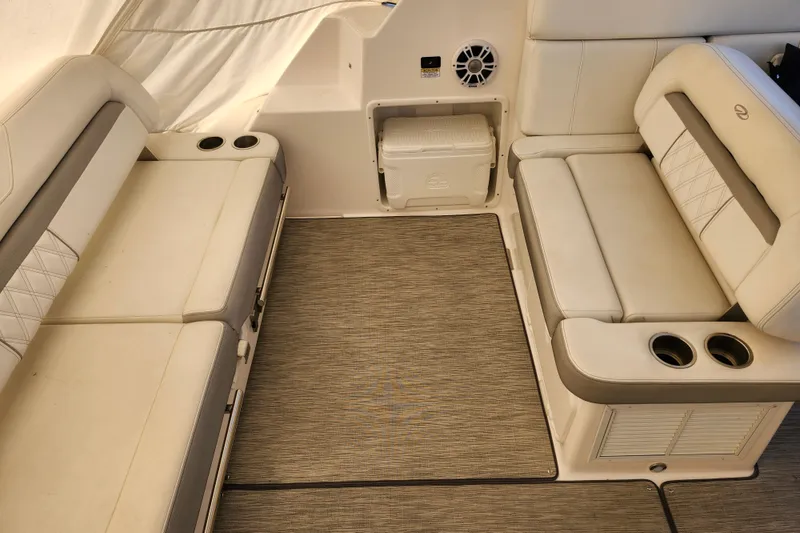 Slide: The Image of Luxurious seating area on a 2019 Regal 35 Sport Coupe boat interior. - 5